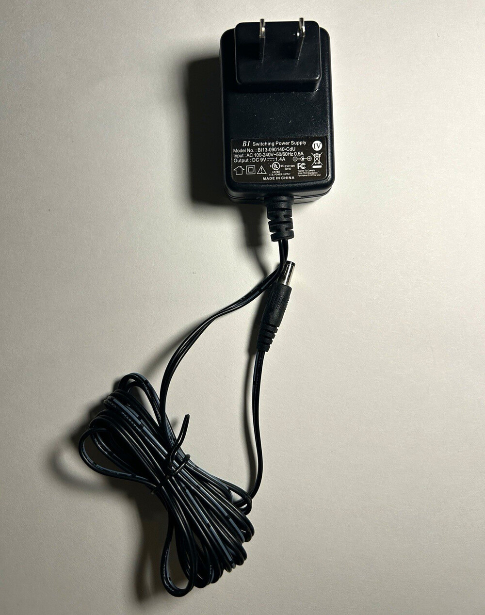 BI Switching Power Supply AC/DC Adapter 9V DC Barrel Plug Black